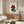 Abstract expressionist framed art depicting an ethereal woman, bird, and star in black line work and vivid color blocks, evoking both playfulness and introspection.