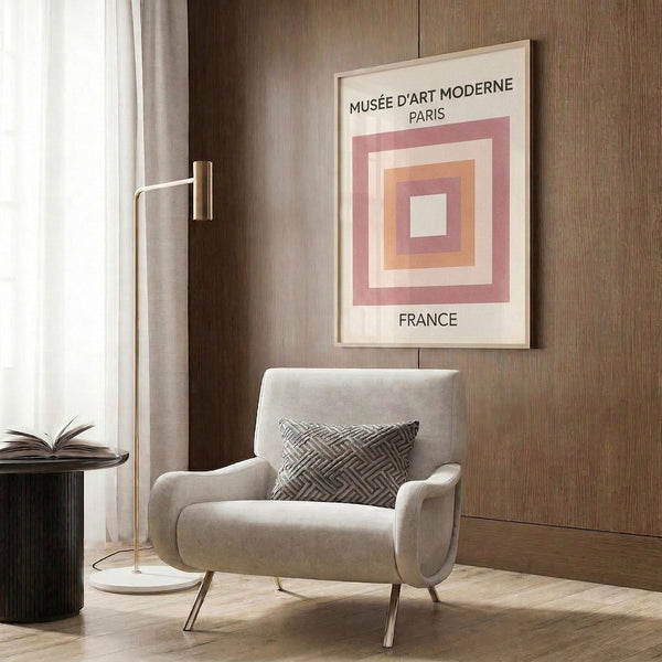 Minimalist Bauhaus design with overlapping squares in soft cream, dusty pink, and mauve tones, framed on a wall.