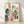 Minimalist line art collage of musical instruments and botanical elements in cream, blush pink, teal, and gold, framed poster on wall.