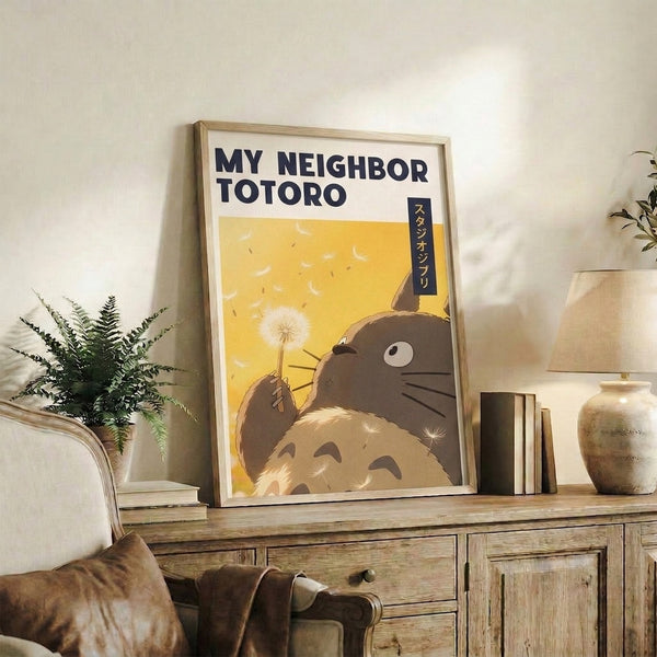 Anime wall art featuring the beloved Totoro character with a blooming dandelion, rendered in warm earthy tones and gold highlights against a peaceful sunset backdrop inspired by Studio Ghibli.