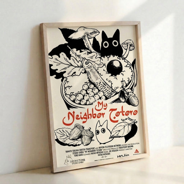 Cream-colored poster art displaying an enchanting forest spirit creature amid botanical details like acorns and berries, rendered in minimalist black and red linework.