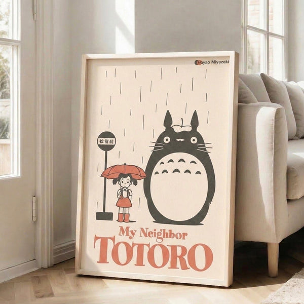 Whimsical wall art capturing a quiet moment between Totoro and a young girl with umbrella in rainy weather, featuring retro minimalist style and a soothing palette of cream, gray, and coral.