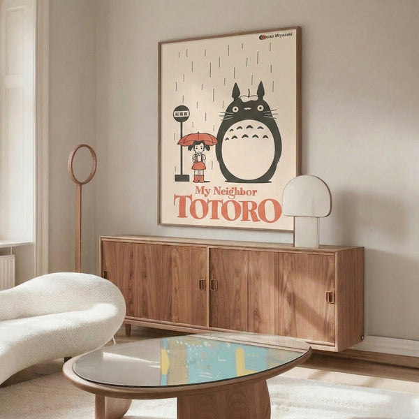 Studio Ghibli-style wall poster presenting a tranquil rainy bus stop scene with Totoro and young girl, executed in minimalist retro aesthetic with cream, charcoal, and coral color palette.