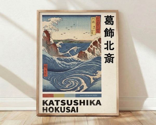 Dramatic Japanese woodblock print depicting a swirling indigo whirlpool with crashing waves, a small boat, and distant cliffs in cream, rust, and forest green tones.