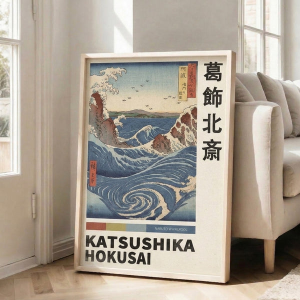 Traditional Japanese woodblock-style print of a dramatic whirlpool scene with swirling water, cliff formations, and a boat, using rich indigo blue and contrasting warm accent colors.