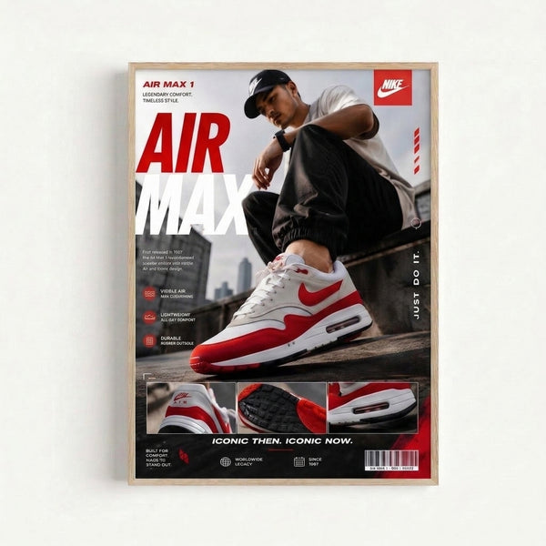 Iconic sneaker culture artwork showcasing an Air Max 1 shoe in bold red and white tones with gray cityscape elements, displayed as a framed print.