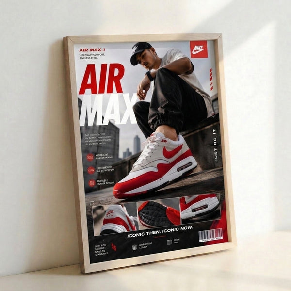 Street culture-inspired poster art of a red and white Air Max 1 sneaker set against a contemporary urban backdrop in monochromatic tones.