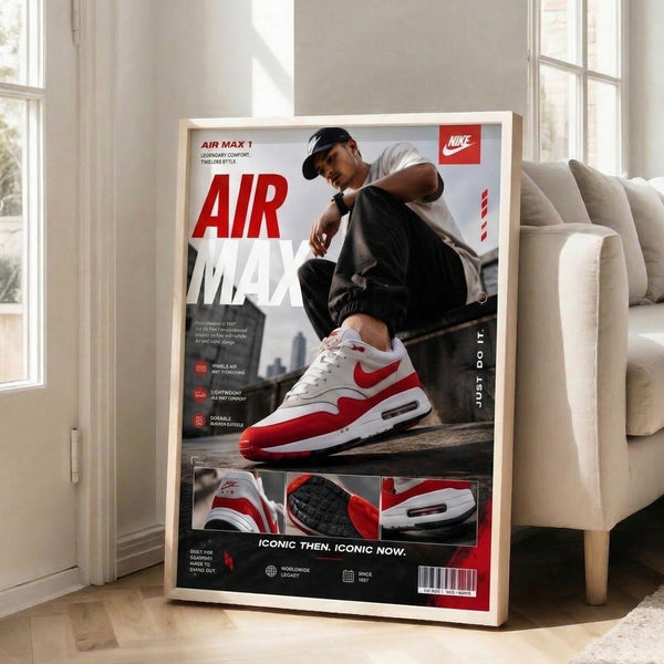 Modern sneaker artwork celebrating iconic Air Max 1 design in classic red, white, and black palette with urban landscape imagery.