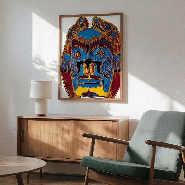 Framed art print of a Northwest Coast mask in electric, jewel-toned colors with the graphic intensity and cultural appropriation playfulness of retro 1980s Pop art.
