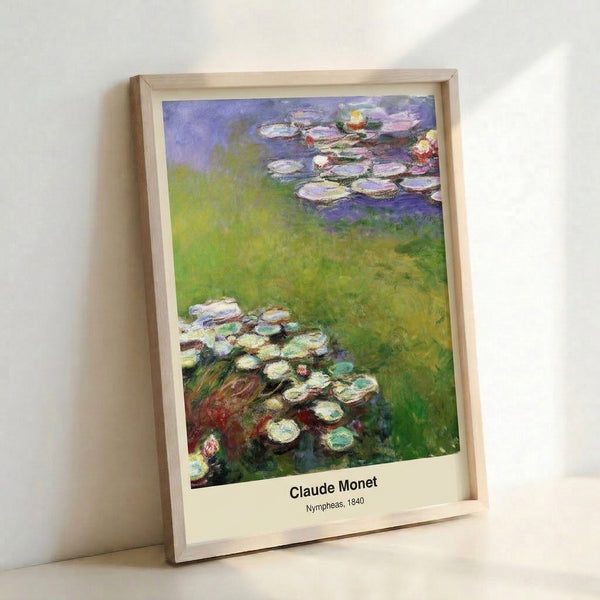 Framed art print displaying floating water lilies in an impressionist style with pale yellows, soft blues, and green foliage in a tranquil pond setting.