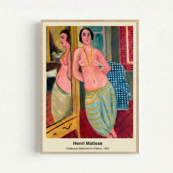 Art Nouveau-inspired framed print of a contemplative odalisque reflected in a mirror, rendered in warm ochres, coral, and cream with striking deep blue geometric elements.
