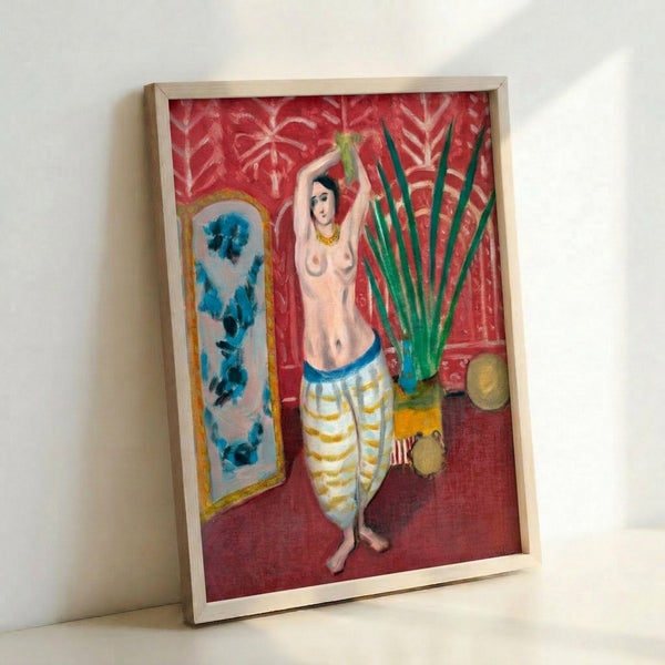 Wall-mounted print of Matisse's Odalisque With A Screen, showcasing relaxed human forms and decorative interior elements in muted ochres, blues, and greens.