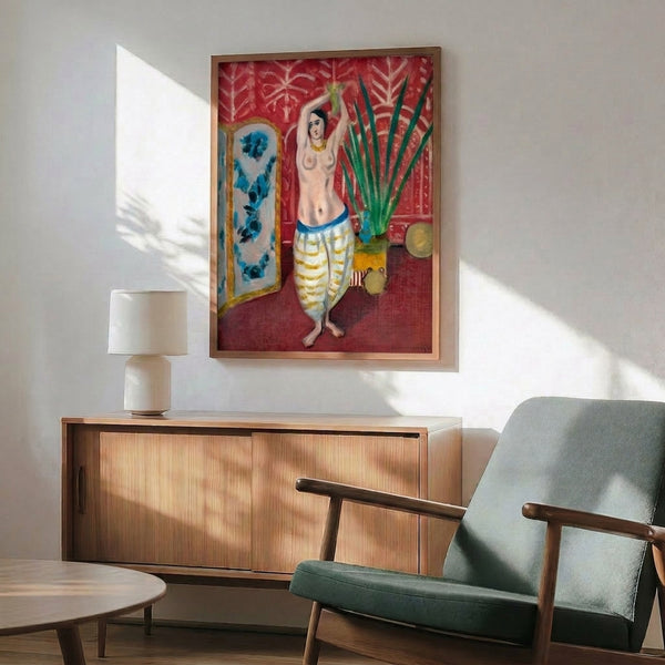 Matisse's odalisque composition framed as a print, blending human presence with patterned screens and furnishings in subdued, naturalistic tones.