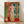 Matisse-inspired odalisque figure posed with hands clasped behind her back, rendered in flowing lines and warm earthy tones with touches of vibrant color.