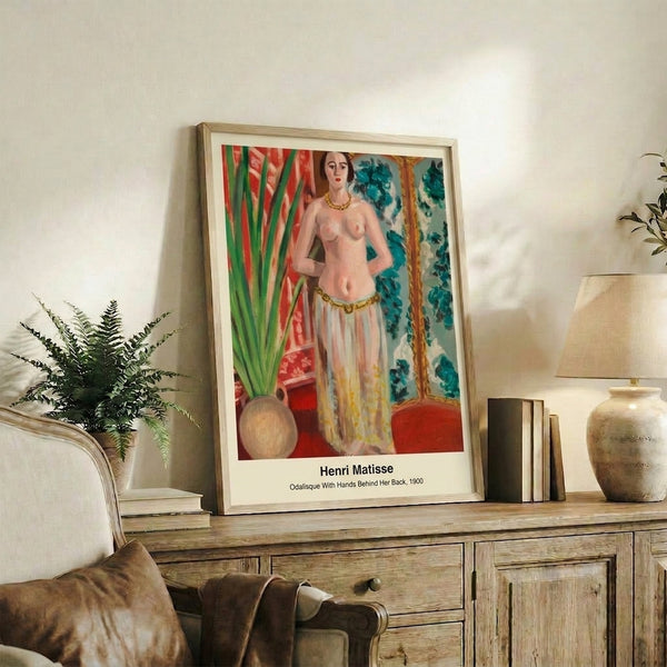 Sensual figure study of a reclining odalisque in warm earth tones and soft greens, displaying the contemplative mood and flowing lines characteristic of early modern artistic tradition.