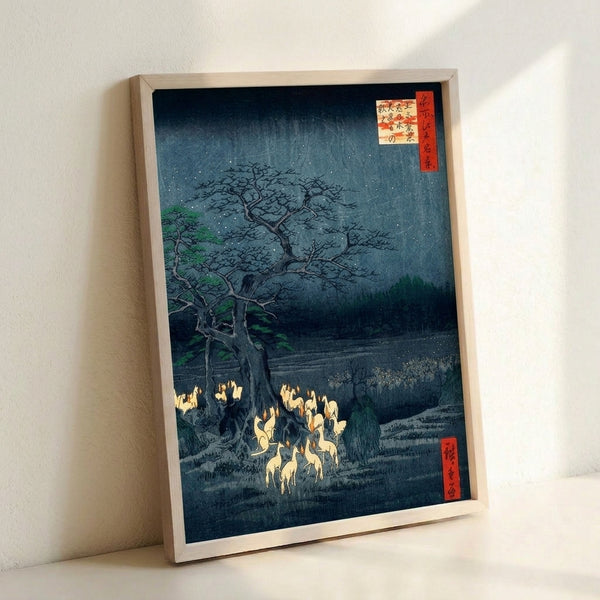 Haunting Japandi-style art print depicting nocturnal foxes with fox fire dancing through dark woodland, rendered in traditional woodblock technique with rich teals and blacks.