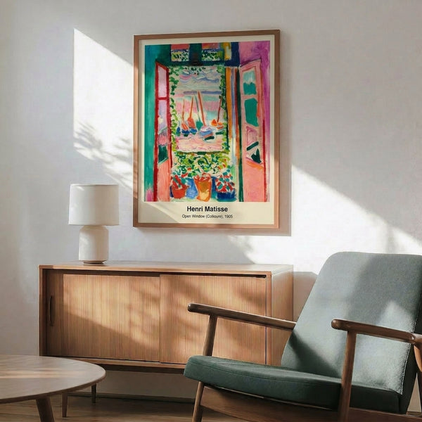 Abstract window artwork in bold modernist style featuring warm and cool color contrasts, a glimpsed harbor view, and interior elements arranged as a dynamic composition.