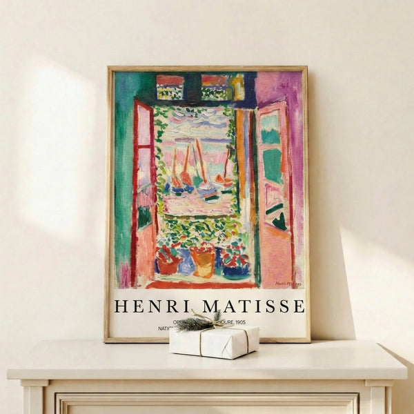 Art Nouveau-style print depicting a luminous window scene with vibrant flowers, ocean vista, and small sailboat rendered in bold emerald, golden yellow, and ocean blue hues.