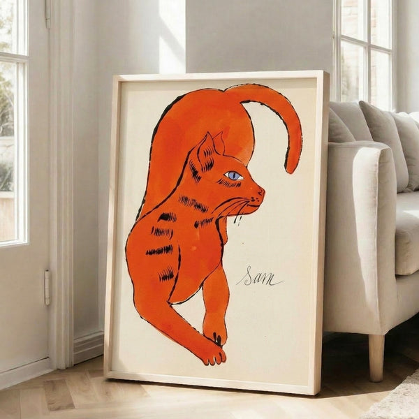 Orange cat art print in pop art aesthetic with bright, saturated tones and graphic style, presented as framed wall decor.