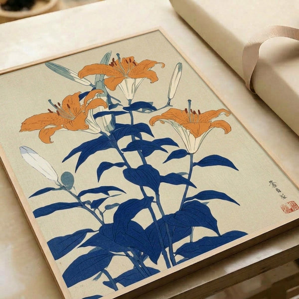 Serene botanical wall art print depicting delicate tiger lilies in warm orange and cream tones with sage and navy blue accents, inspired by traditional Japanese woodblock technique.