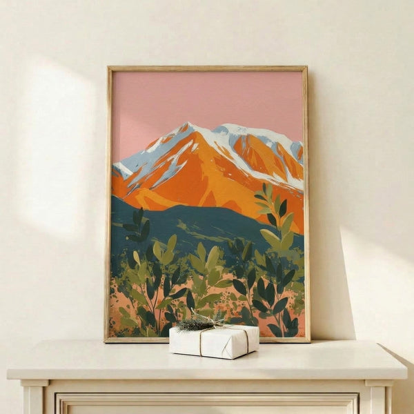 Minimalist desert sunset artwork with geometric mountain ranges in soft pink and orange tones, olive green accents, and stylized cacti in contemporary mid-century style.
