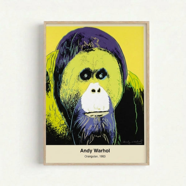 Framed modern art print of an orangutan rendered in striking neon colors including magenta and lime green, reflecting pop art's energetic aesthetic.