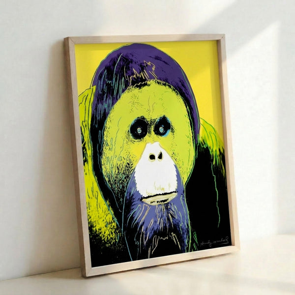 Vibrant contemporary pop art print of an orangutan with striking color blocking in turquoise, orange, and lime green tones.
