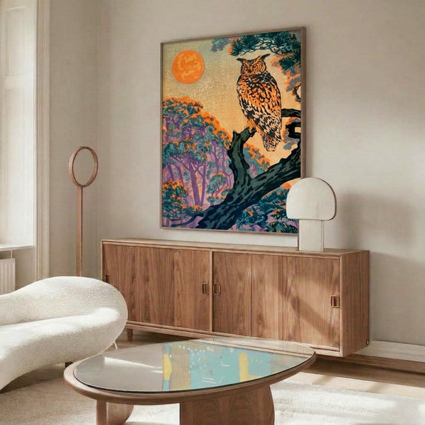 Japanese-inspired woodblock print of a great horned owl on a moonlit pine bough with Art Nouveau styling in black, orange, cream, and teal hues creating a mysterious night atmosphere.