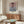 Classic Impressionist wall art of the Venetian Palazzo Contarini, rendered in dreamy soft colors with a solitary boat on the water, evoking serene waterside tranquility.