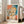 Geometric portrait artwork in terracotta and cream hues depicting two figures with minimalist features, exemplifying Bauhaus design principles in this framed wall art.