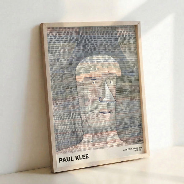 Contemplative faceless head composed of angular planes in cream, tan, and soft grey-blue, exemplifying Klee's minimalist geometric approach to portraiture.