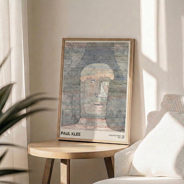 Angular, faceless portrait in subdued palette of grey-blue, cream, and muted greens; a framed Bauhaus masterpiece embodying geometric minimalism.