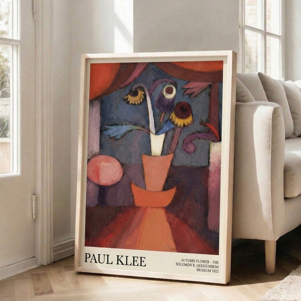 Bauhaus-style abstract composition merging botanical and facial elements in a stylized vase, rendered in rich rust orange, deep blue, and ochre warm tones.
