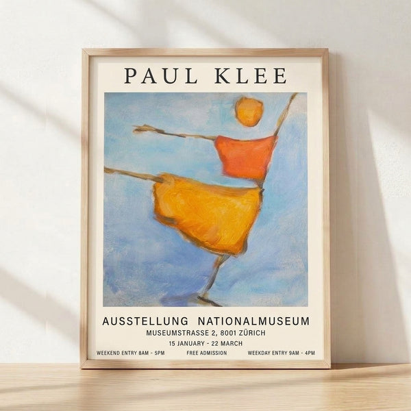 Bauhaus-style poster featuring a whimsical stick figure in warm earth tones and golden yellow with a bright sun, framed on a wall as modern minimalist art.