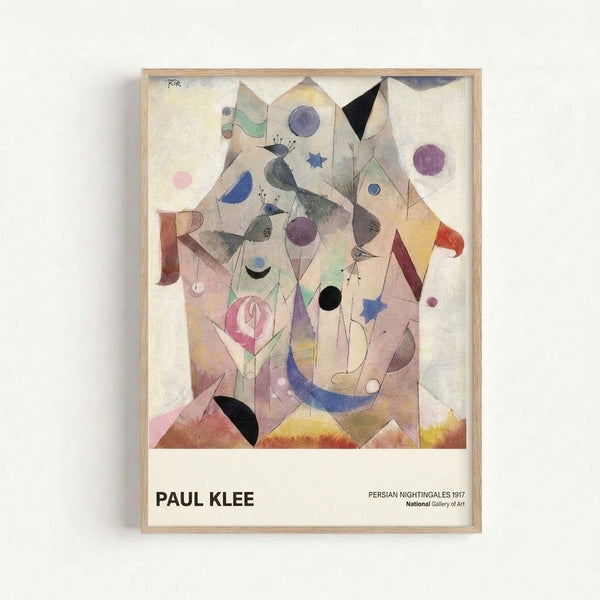 Framed modern art print showcasing Paul Klee's composition of stylized birds and botanical forms in ochre, pink, and purple against a cream background.