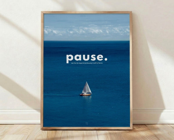 Minimalist sailboat poster with a solitary vessel on deep blue ocean waters beneath a serene sky, featuring teal and cream tones in a modern coastal art style.
