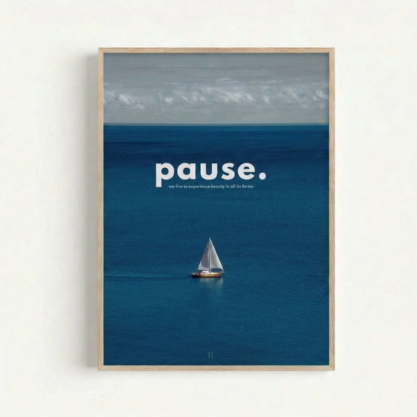 Framed print of a sailboat floating on calm teal waters with gray and white clouds above, evoking contemplation and tranquility in minimalist coastal design.