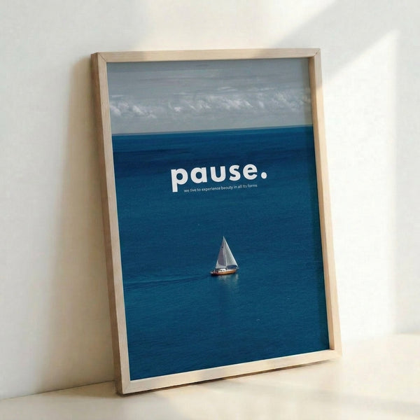 Modern ocean wall art depicting a lone sailboat set against layered blue and cream skies, capturing a sense of peaceful wanderlust and seaside serenity.