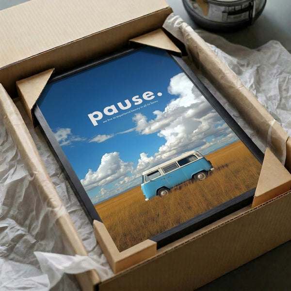 Framed contemporary artwork showing a classic VW van landscape in soothing blue, white, and golden tones, embodying minimalist travel and serenity themes.