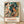Bauhaus-style framed poster featuring abstract cubist figures in teal, rust red, and ochre yellow, depicting a woman, child, and bird in dynamic geometric composition from a 1972 Dakar exhibition.