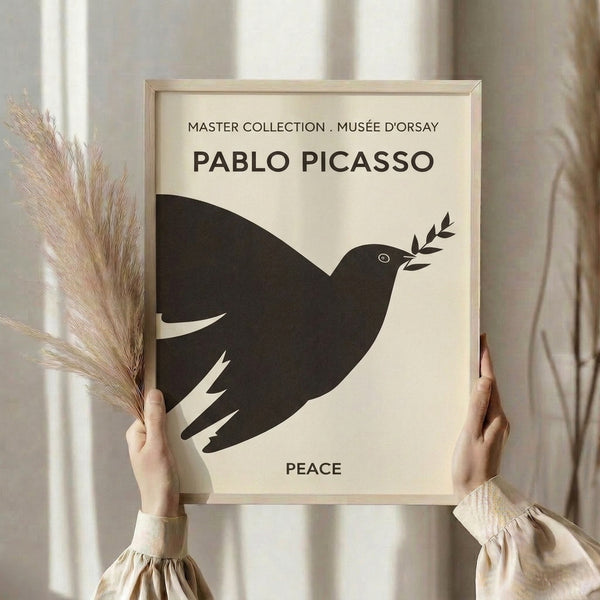 Contemporary minimalist wall art showing a graceful dove with olive branch in black line drawing on off-white ground.