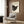 Minimalist black and cream framed art displaying the iconic peace dove with elegant line work and symbolic olive branch.