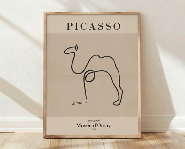 Minimalist line drawing of a camel in black ink on cream background, framed poster with elegant single-line modern art style.