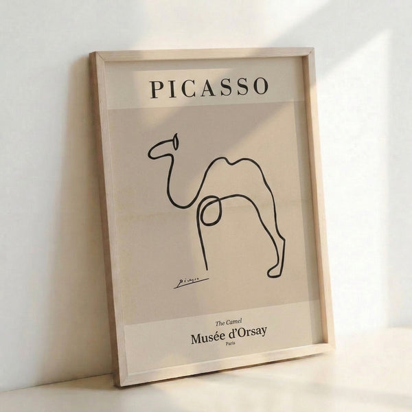 Abstract single-stroke camel portrait in black and cream, modern line art framed print with wabi-sabi inspired simplicity.