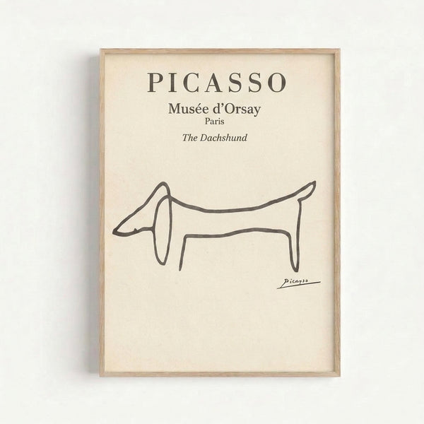 Vintage-style line drawing of a playful dachshund rendered in simple strokes, framed art print in muted charcoal and cream tones.