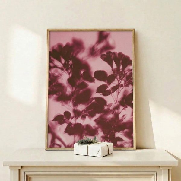 Serene watercolor painting of botanical forms in blush and burgundy hues with loose, flowing brushstrokes creating an ethereal floral composition.