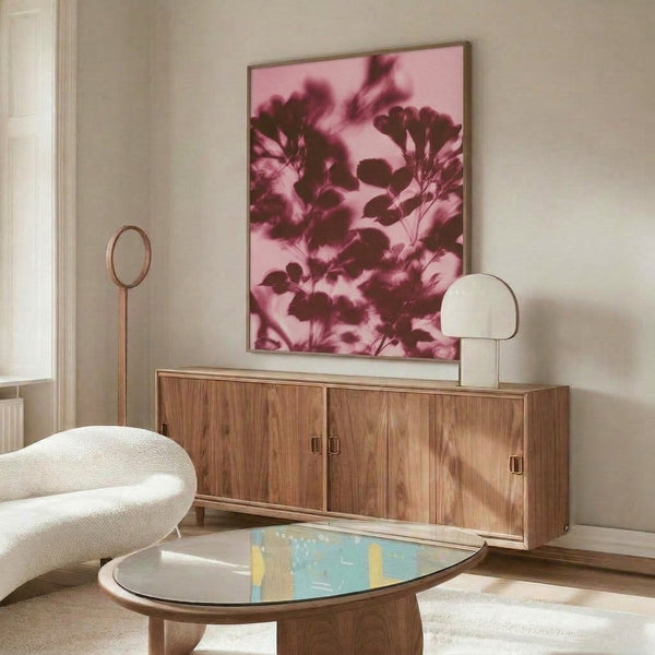 Delicate watercolor botanical print rendered in soft rose pink, burgundy, and blush tones with abstract flower and leaf shapes in a peaceful, understated style.
