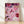 Glamorous pop art poster featuring a woman's hand with playing cards, dice, poker chips, cocktail, and champagne in shades of pink, burgundy, and gold, capturing a sophisticated casino nightlife mood.