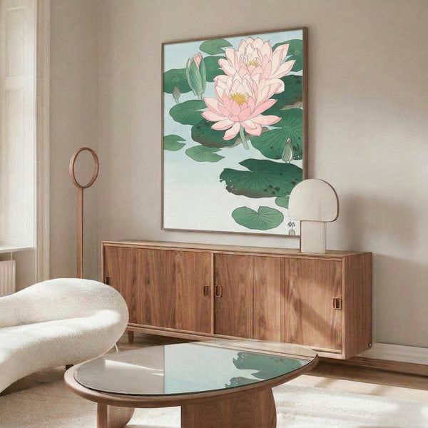 Minimalist Japanese-inspired botanical poster of a soft pink water lily with layered green foliage, creating a serene zen composition on wall.