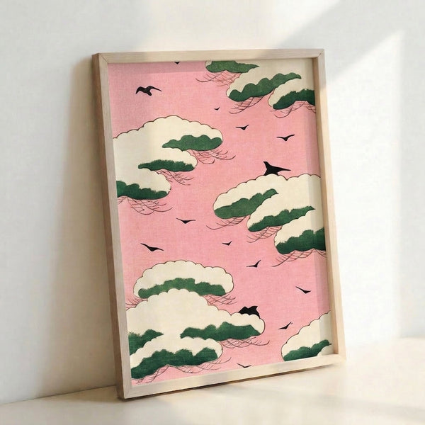 Whimsical framed art print in Japanese woodblock tradition showing a bird perched near pine foliage against a soft pink sky with cloud formations.